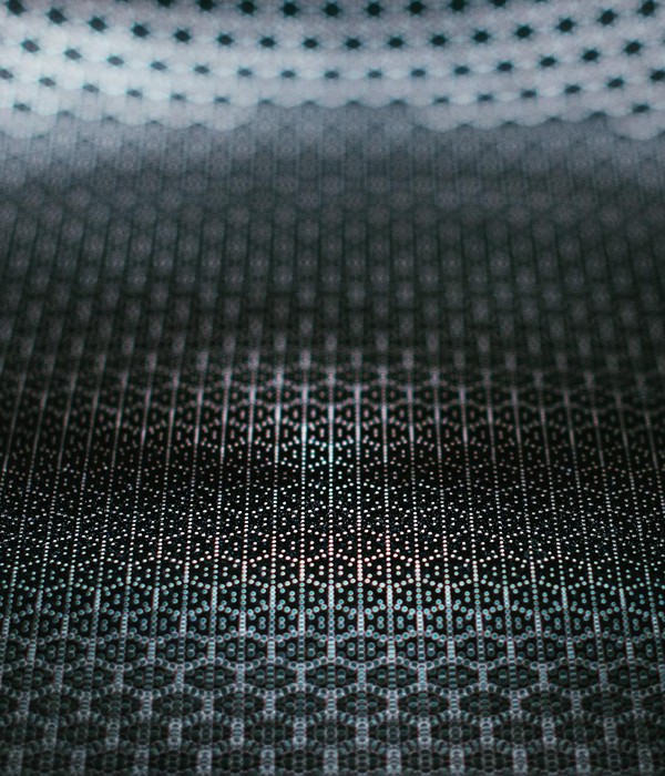 Dark abstract textured metallic surface with geometric pattern for modern design.